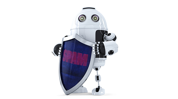 Robot with the shield. Spam protection concept. Isolated over white. Contains clipping path
