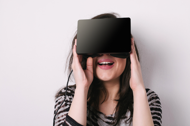 Young Woman Wearing Virtual Reality Headset