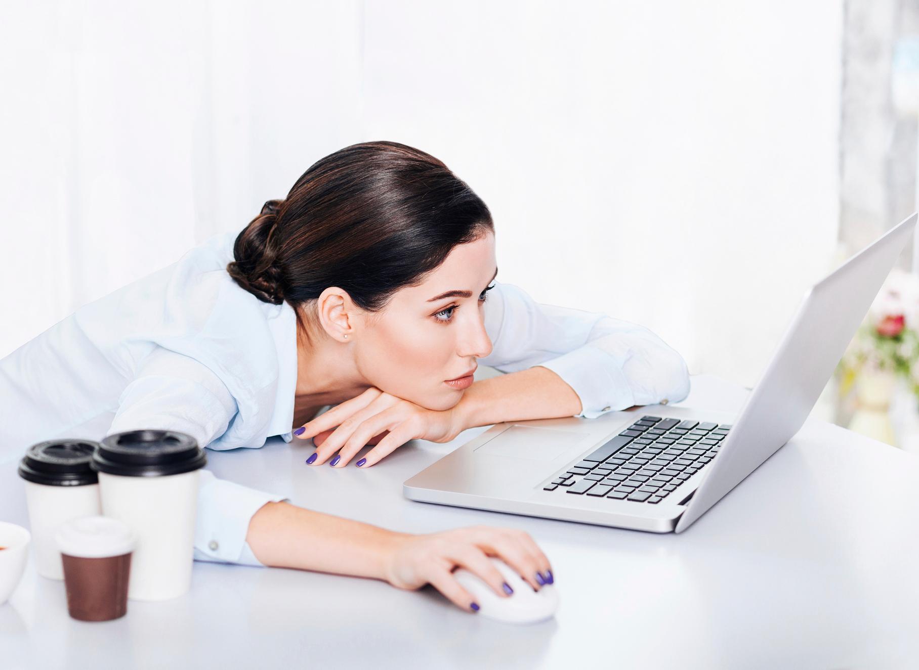 Tired woman in the office